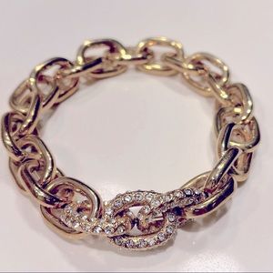 Gold chain link bracelet with rhinestone detail